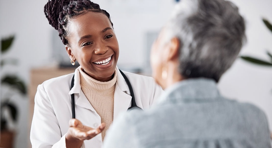 Doctor speaking to her patient